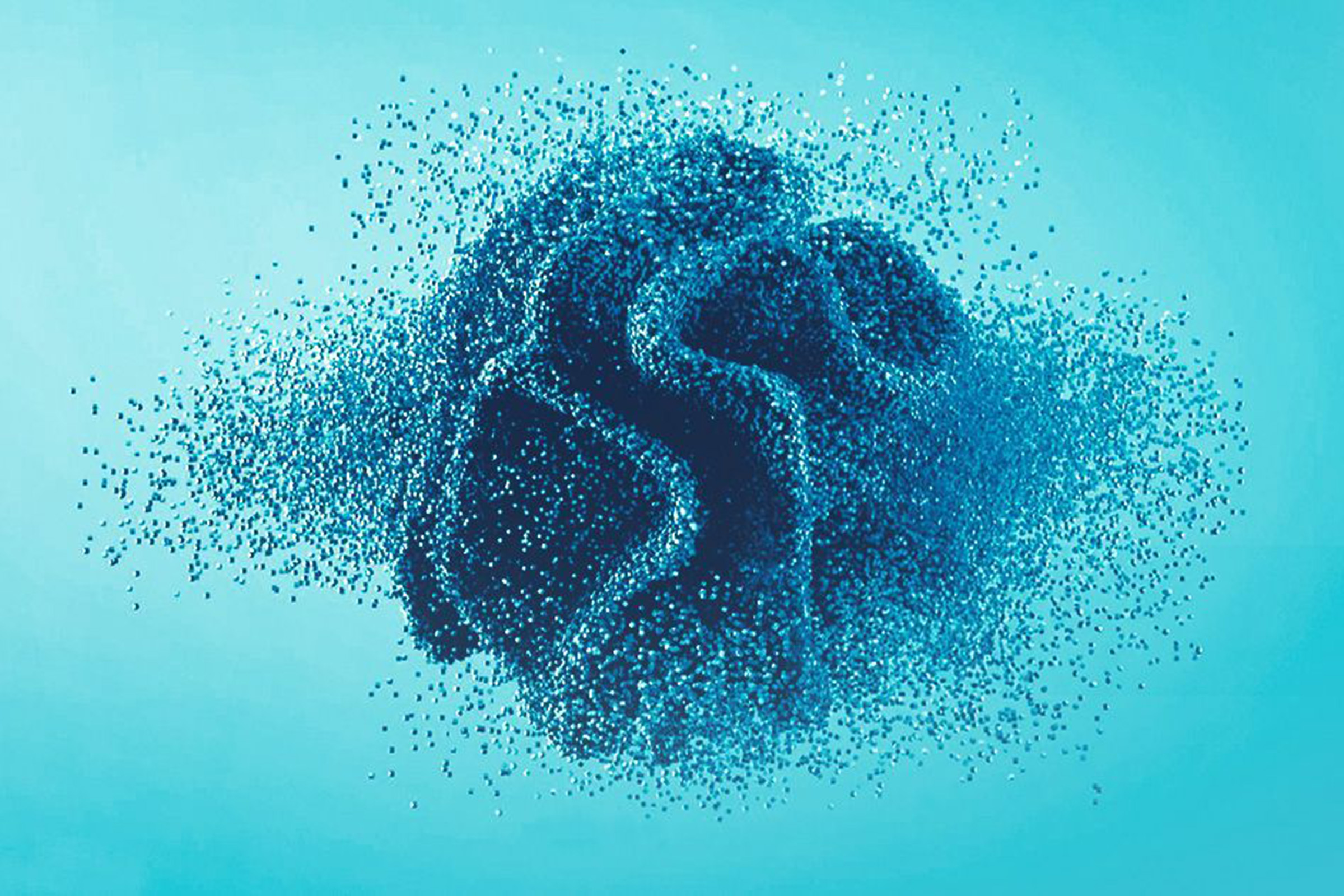 Blue particles form a pattern against a teal background